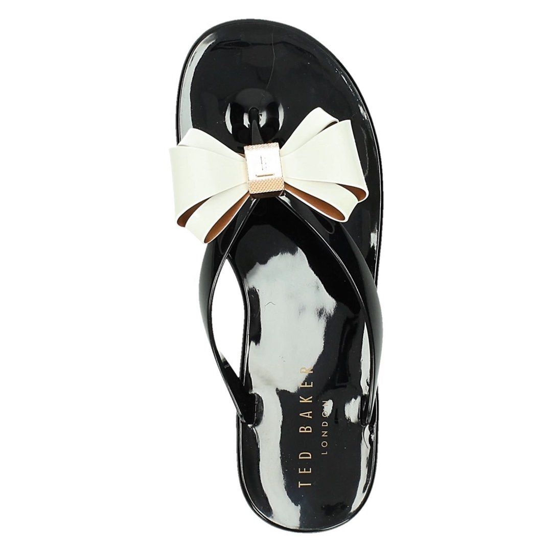 Ted Baker Bow Detail Jelly Flip Flops (Category: Flats & Sandals) located in Butuan. Submitted by wear.next (Listing ID 1436030170, Image 1). Description: Authentic Size 3 ted size, fits 35-36 eur No inclusion .