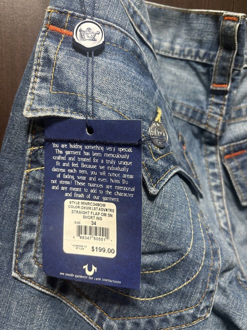 True Religion Straight Flap Jeans - Size 34 (Category: Jeans) located in Davao. Submitted by thriftnroll (Listing ID 1436037229, Image 3). Description: - Authentic True Religion jeans - Size: 34 - Style: Straight leg - Features flap pockets - Classic blue wash with orange stitching - Made in Mexico - Includes original tags - Style code: MNRC348OM -3,500php Shipped Thank you.