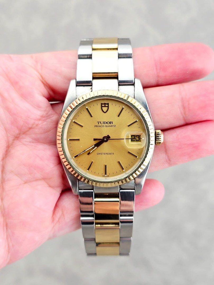 Tudor Prince Watch (Category: Luxury Watches) located in Cabanatuan. Submitted by albertgonzales27 (Listing ID 1435937760, Image 1). Description: - Tudor Prince - Gold dial - Date display at 3 o'clock - Stainless steel and gold-tone bracelet - Tudor-signed clasp - Fluted bezel - Gold-tone crown.