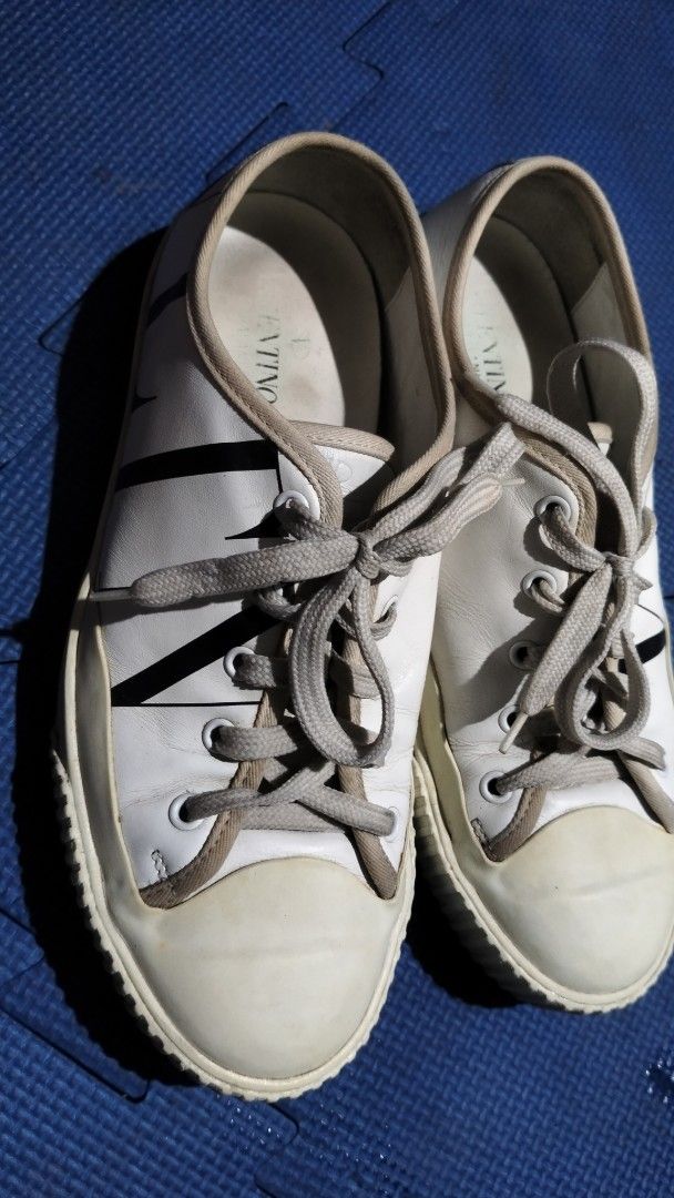 Valentino Garavani Open Sneakers (Category: Sneakers) located in Masinloc. Submitted by peterpalay.preloved (Listing ID 1436094621, Image 3). Description: - Valentino Garavani - White Leather upper with white sole - Size: 40.5 - Valentino logo detail - Signs of wear VALENTINO GARAVANI MATERIALS: GENIUNE LEATHER color: WHITE size: 40.5 ON TAG 7/10 condition WITH SIGN OF USAGE. AUTHENTICITY NOT GUARANTED. still nice in actual , but still manage ur 
