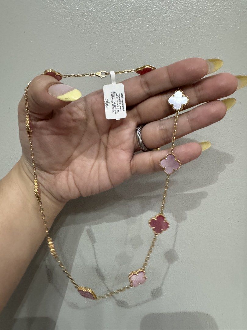 Van Cleef & Arpels Vintage Alhambra Necklace (Category: Necklaces) located in San Mateo. Submitted by donnalewisss (Listing ID 1436011403, Image 2). Description: - Authentic Van Cleef & Arpels Vintage Alhambra necklace - 18K gold with pink mother of pearl and guilloche clover motifs - Clover size: 10mm - Gold weight: 21.70 grams - A beautiful and elegant piece.