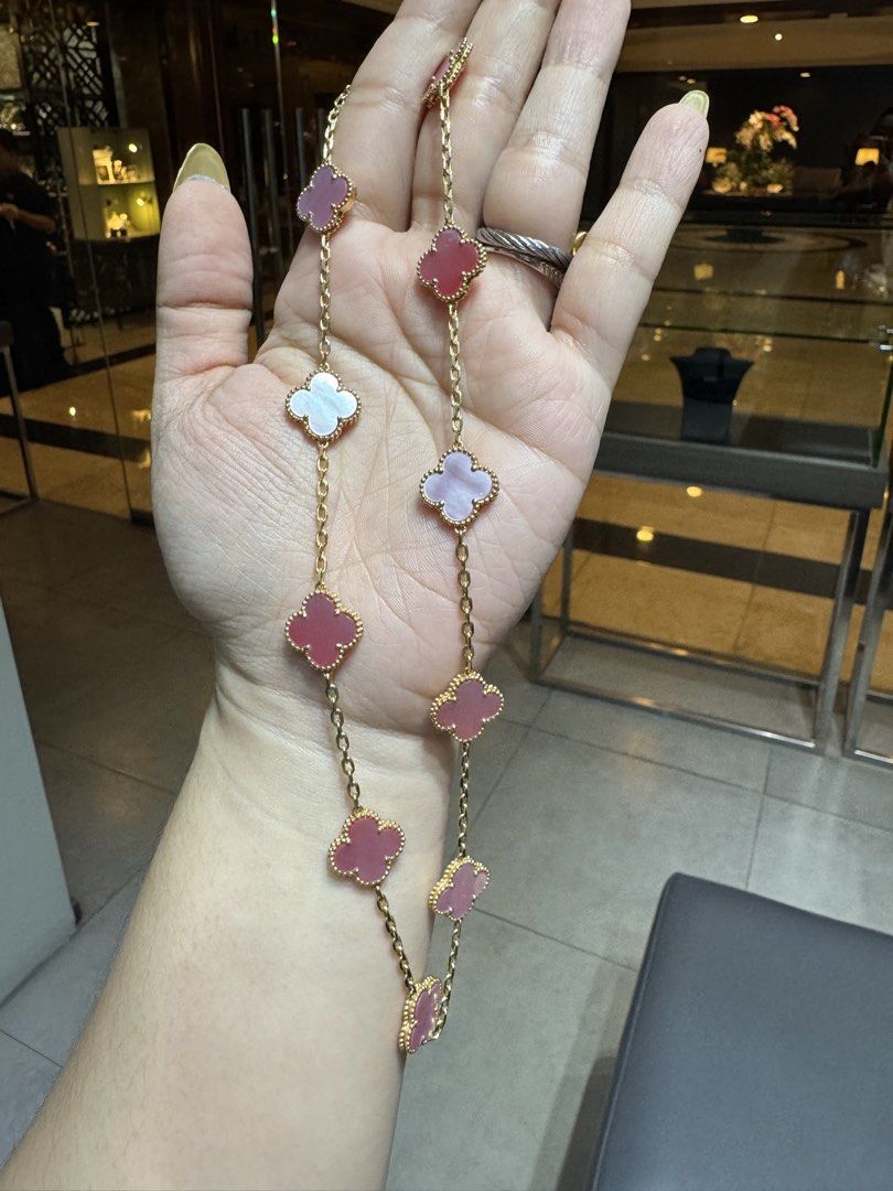 Van Cleef & Arpels Vintage Alhambra Necklace (Category: Necklaces) located in San Mateo. Submitted by donnalewisss (Listing ID 1436011403, Image 1). Description: - Authentic Van Cleef & Arpels Vintage Alhambra necklace - 18K gold with pink mother of pearl and guilloche clover motifs - Clover size: 10mm - Gold weight: 21.70 grams - A beautiful and elegant piece.