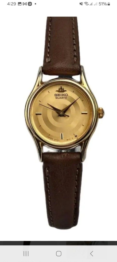 Vintage Seiko Quartz Watch with Brown Strap (Category: Women's Watches) located in Mandaluyong City. Submitted by twixie94147 (Listing ID 1436017841, Image 1). Description: - Seiko Quartz watch - Gold-toned face - Brown leather strap - Classic round dial - Timeless design.