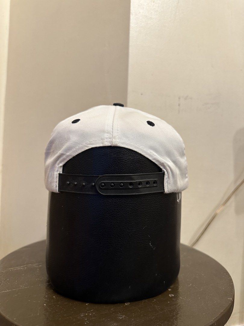 Vintage Stooth Atlanta 1996 Olympics Cap (Category: Caps & Hats) located in Bacoor. Submitted by realbacktrack (Listing ID 1435992443, Image 3). Description: - Vintage Atlanta 1996 Olympics cap -Small head frame - Embroidered Olympic torch logo - Black brim - White crown with black accents - Adjustable strap for a comfortable fit - Green lining - Includes original tag *hairlines on snap .