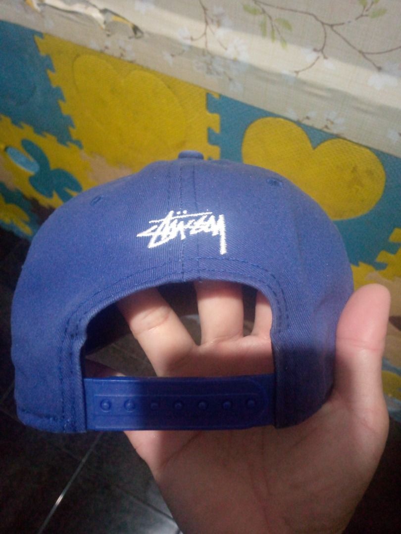 Vintage Stussy N°4 Cap (Category: Caps & Hats) located in Imus. Submitted by chadrich_05 (Listing ID 1436008438, Image 2). Description: - Blue Stussy cap - White embroidered "STUSSY N°4" logo - Flat brim - Structured crown - Classic snapback style - Solid blue color.