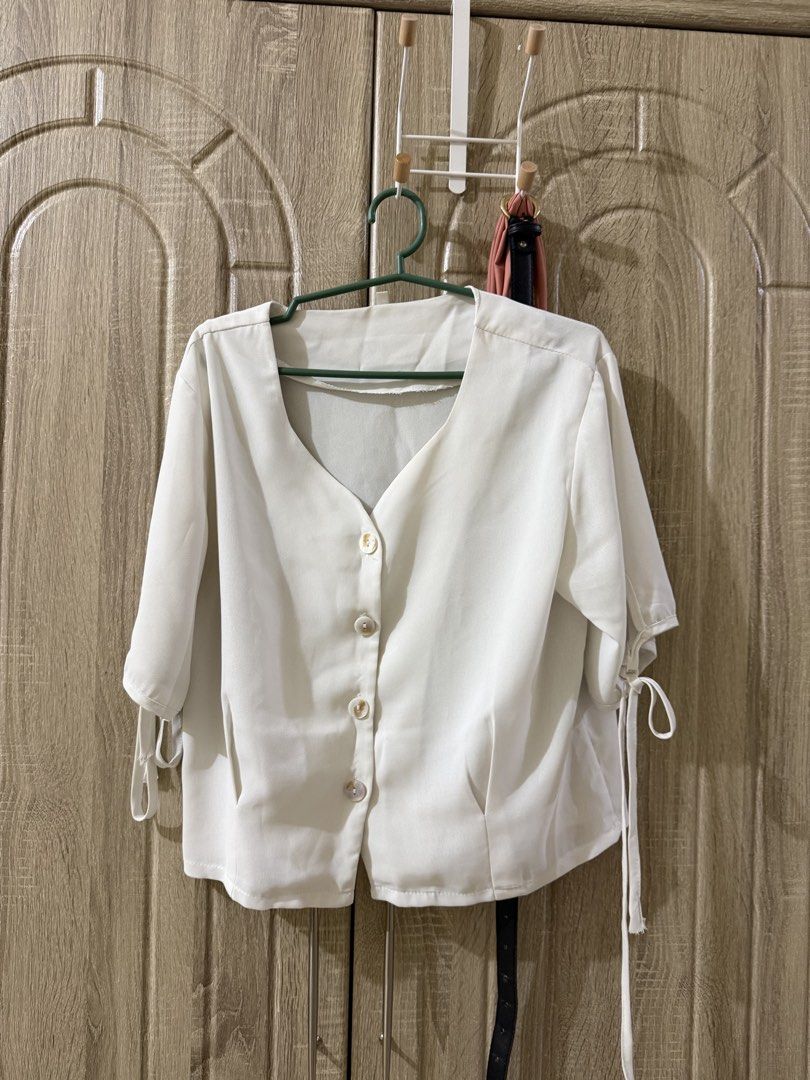 White tops (Category: Blouses) located in Makati City. Submitted by marj_declutters (Listing ID 1436022162, Image 1). Description: - best fits small-medium - 50 php each.