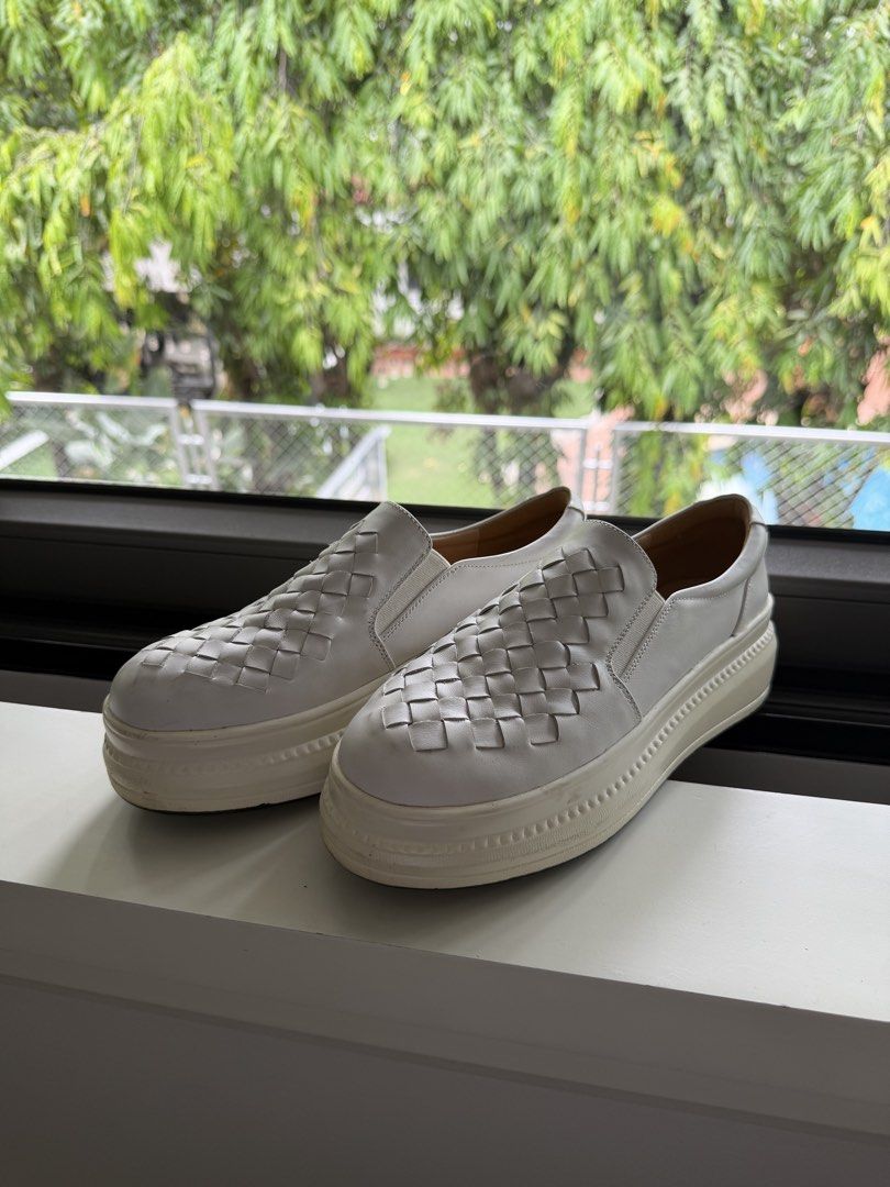 White Woven Slip-on Sneakers (Category: Sneakers) located in Manila. Submitted by decluttersiris (Listing ID 1435927300, Image 3). Description: - White slip-on sneakers - Woven design on upper - Thick, off-white sole - Rounded toe - Smooth, leather-like interior - Simple and versatile design - Suitable for casual wear.
