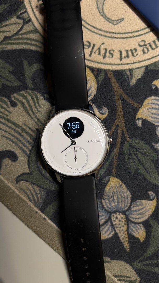 Withings Steel HR Smartwatch (Category: Wearables & Smart Watches) located in Paranaque City. Submitted by btslite (Listing ID 1436088172, Image 3). Description: - Withings Steel HR smartwatch - White watch face - Black strap with extra blue strap - Displays time, date, steps, and battery percentage - Features heart rate monitor - In good working condition - with charger ⚠️ Condition: Pre-loved / second-hand. Not brand new—may have minimal signs 