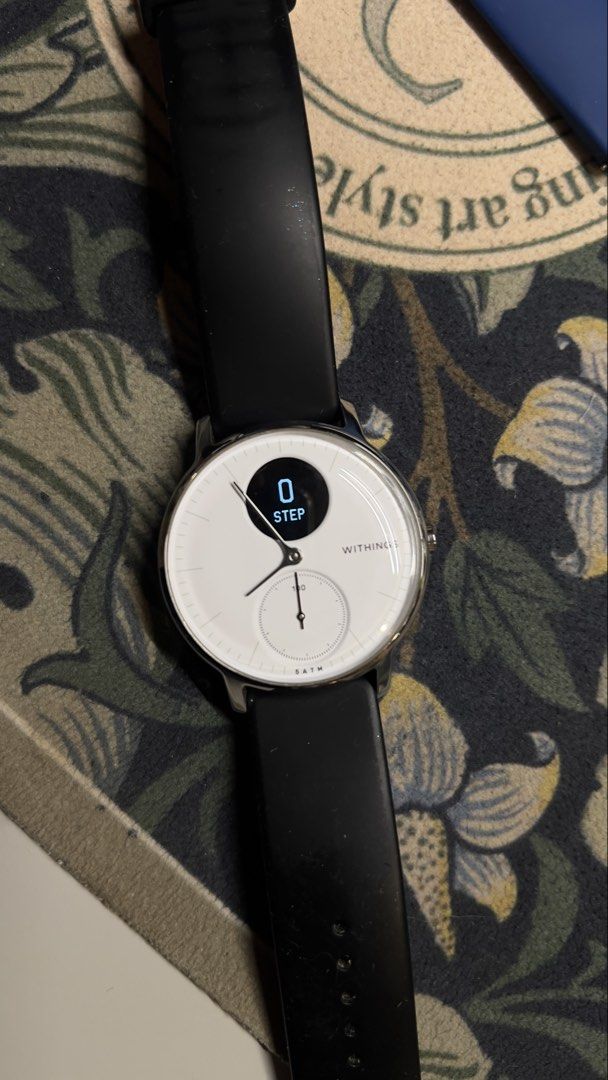Withings Steel HR Smartwatch (Category: Wearables & Smart Watches) located in Paranaque City. Submitted by btslite (Listing ID 1436088172, Image 1). Description: - Withings Steel HR smartwatch - White watch face - Black strap with extra blue strap - Displays time, date, steps, and battery percentage - Features heart rate monitor - In good working condition - with charger ⚠️ Condition: Pre-loved / second-hand. Not brand new—may have minimal signs 
