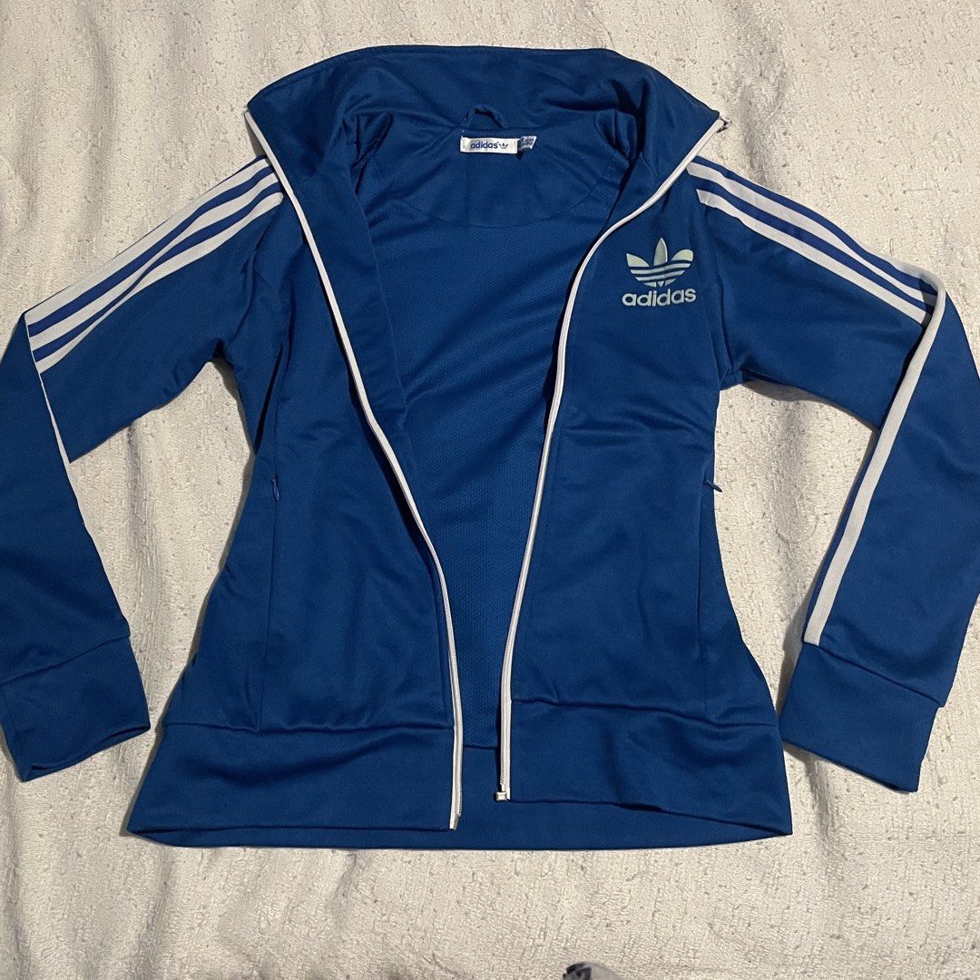 womens adidas tracksuit jacket blue (Category: Coats, Jackets and Outerwear) located in Quezon City. Submitted by froodless (Listing ID 1436021150, Image 1). Description: XS-S main zipper is broken but pocket zippers are perfectly fine.