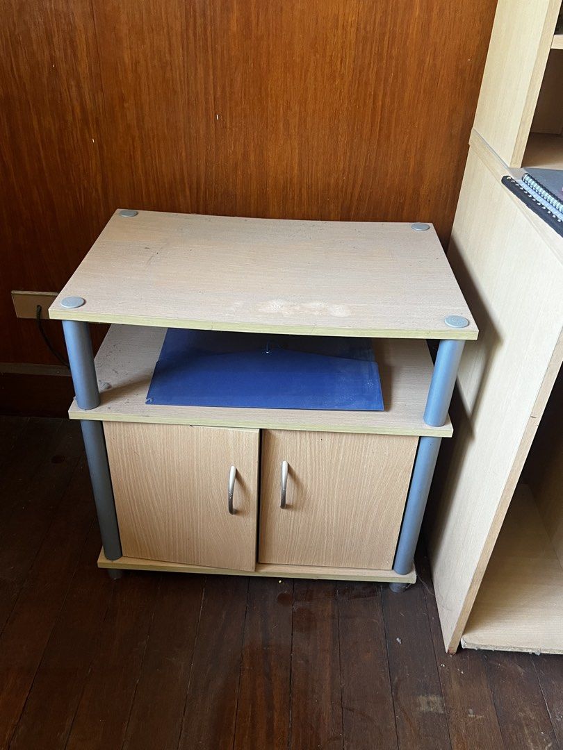 Wooden Computer Desk with Shelves (Category: Tables & Sets) located in Paranaque City. Submitted by jtong00 (Listing ID 1436030142, Image 2). Description: - Wooden computer desk - Multiple shelves and drawers - Side cabinet and built-in hutch - CD/DVD storage - Separate side table with cabinet - Keyboard tray - Ample workspace - Ideal for home office or study.
