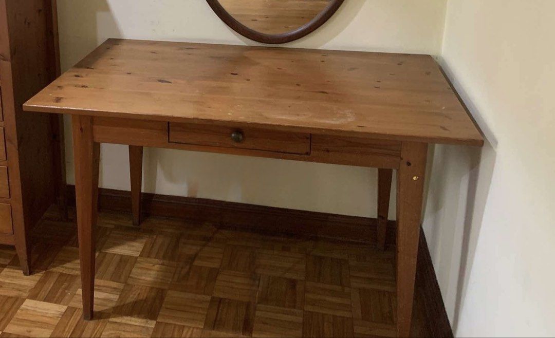 Wooden Table with Drawer (Category: Tables & Sets) located in Muntinlupa City. Submitted by boadogabb97104 (Listing ID 1436096475, Image 2). Description: Solid Wood Study / Work Table – ₱4,000 (Negotiable) Upgrade your space with this sturdy and functional solid wood table—perfect for work-from-home setups, study areas, or minimalist interiors. Details: • Dimensions: 120 cm (L) x 75 cm (W) • Material: Solid wood • With built-in drawer for storage
