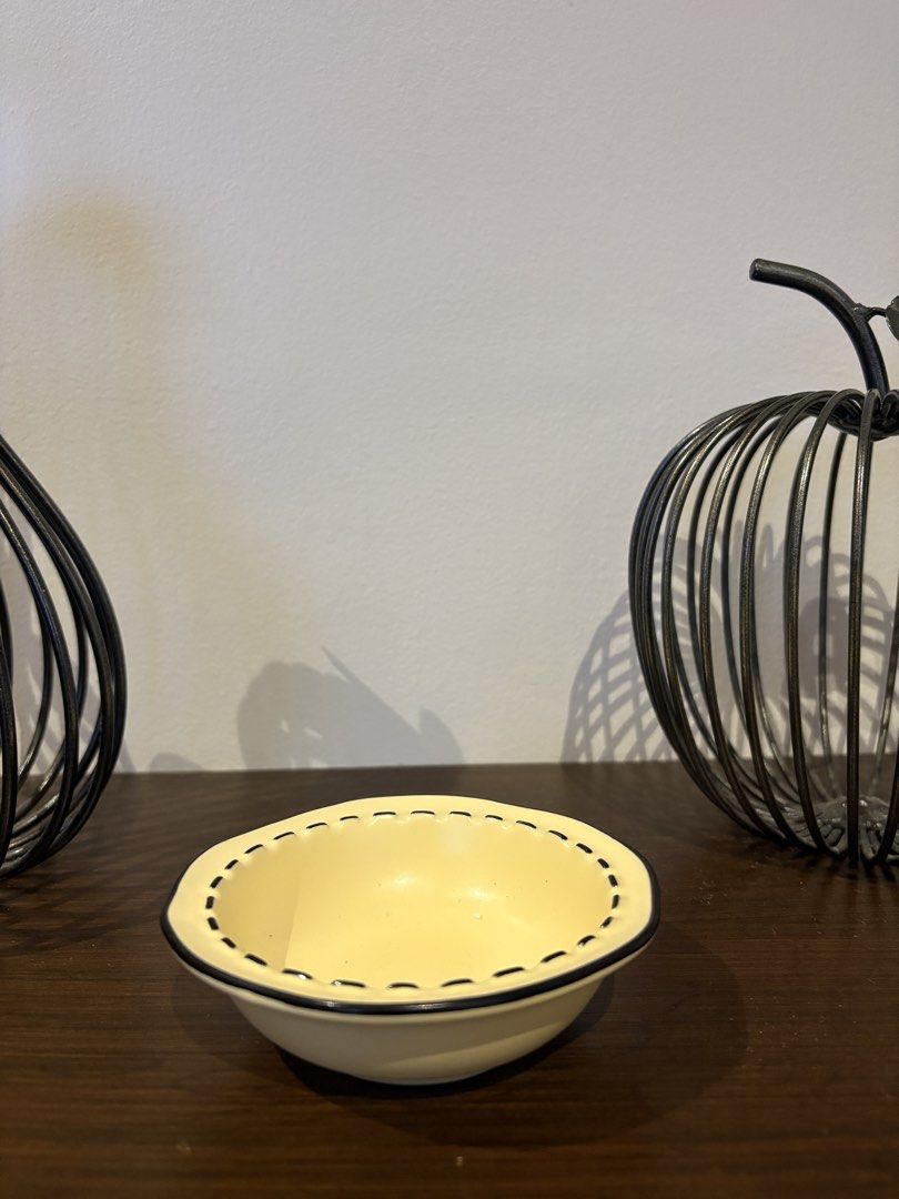Yellow Ceramic Bowl with Black Trim (Category: Other Kitchenware & Tableware) located in Antipolo. Submitted by anabri (Listing ID 1436077828, Image 2). Description: - Small yellow ceramic bowl - Features a black trim with a stitched design - Perfect for serving small portions or as a decorative accent - Slightly irregular shape for a unique look Good condition Decluttering some stuff/mugs to make room for new finds 130 📍Cebu .