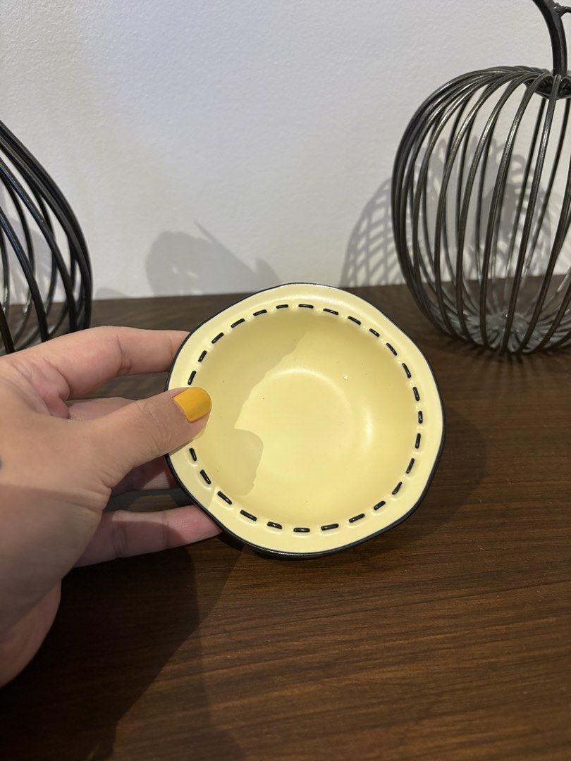 Yellow Ceramic Bowl with Black Trim (Category: Other Kitchenware & Tableware) located in Antipolo. Submitted by anabri (Listing ID 1436077828, Image 3). Description: - Small yellow ceramic bowl - Features a black trim with a stitched design - Perfect for serving small portions or as a decorative accent - Slightly irregular shape for a unique look Good condition Decluttering some stuff/mugs to make room for new finds 130 📍Cebu .