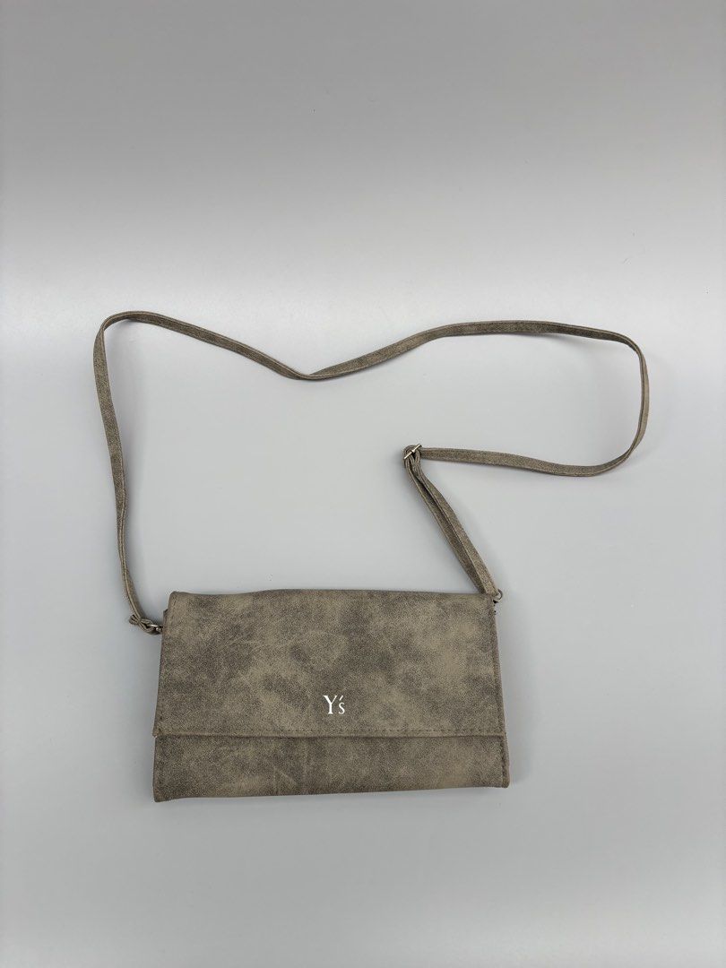 Yohji Yamamoto Y’s Sling Leather Bag (Category: Luxury Bags & Wallets) located in Baguio. Submitted by thecollector2600 (Listing ID 1436080598, Image 1). Description: Waller type sling bag Length-8 Width - 1 Height- 4.5 Strap drop-19 (adjustable).