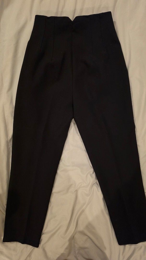 ZARA Black Trousers - Size S (Category: Jeans) located in Muntinlupa City. Submitted by mdoc.declutter (Listing ID 1436042336, Image 3). Description: ZARA Black Tailored Trousers Size: EUR S / US S High-waisted fit Straight leg cut Structured, tailored style Good condition – No major flaws Classic staple piece RFS: Decluttering Shipping from: Muntinlupa / Taguig (c/o buyer) Payment: BDO / BPI / UB / GCash / Maya.
