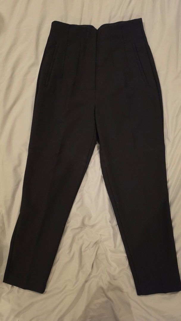 ZARA Black Trousers - Size S (Category: Jeans) located in Muntinlupa City. Submitted by mdoc.declutter (Listing ID 1436042336, Image 1). Description: ZARA Black Tailored Trousers Size: EUR S / US S High-waisted fit Straight leg cut Structured, tailored style Good condition – No major flaws Classic staple piece RFS: Decluttering Shipping from: Muntinlupa / Taguig (c/o buyer) Payment: BDO / BPI / UB / GCash / Maya.