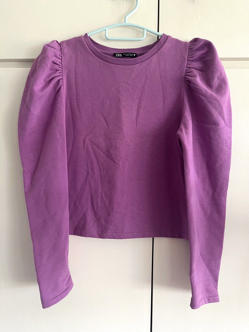 Zara Puff Sleeve Sweatshirt - Purple (Category: Longsleeves) located in Pasig City. Submitted by TrishODeclutter (Listing ID 1435971316, Image 1). Description: - Zara purple sweatshirt with puff sleeves, made in Turkey, size S - Like new, used twice, store bought at Zara Shang RFS: Decluttering pre-pregnancy clothes, help me buy clothes that fit 😅 Location: Pasig, near Tiendesitas (buyer books for pick up).