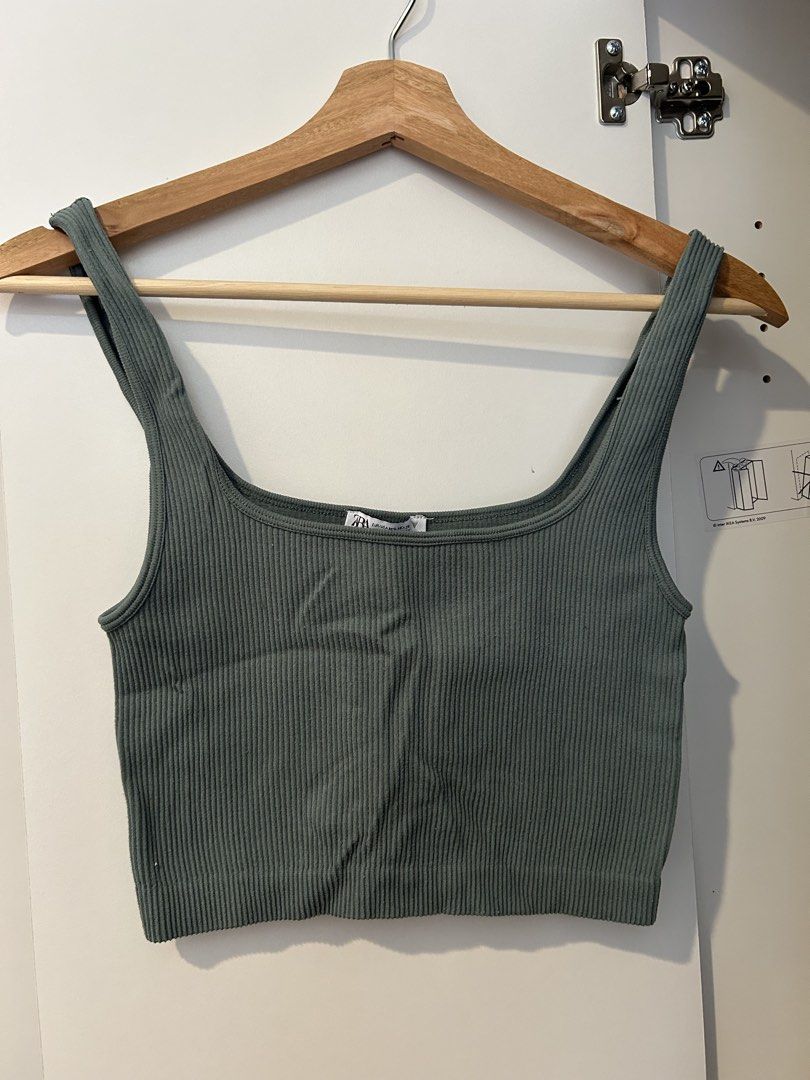 M-L Zara Ribbed Crop Top (Category: Others Tops) located in Manila. Submitted by lex_declutters (Listing ID 1435921862, Image 1). Description: - Zara crop top - Muted green color - Square neckline - Ribbed texture - Size: EUR/USA M-L, MEX 28-30 - Sleeveless - Stretchy material - Versatile style.