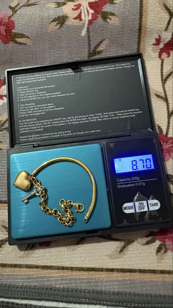 18k Saudi Gold Banglet and Half Hardware (Category: Bracelets) located in Los Banos. Submitted by luxxlady97 (Listing ID 1435352545, Image 3). Description: - Two gold bracelets included. - One bracelet: half hardware chain link design with clasp closure. - Other bracelet: bangle style with heart and key charm. two tone i have other jewelry items for sale at P 7,650 per gram. 18k Saudi Gold Can do meet ups within QC for sure buyers and even inside