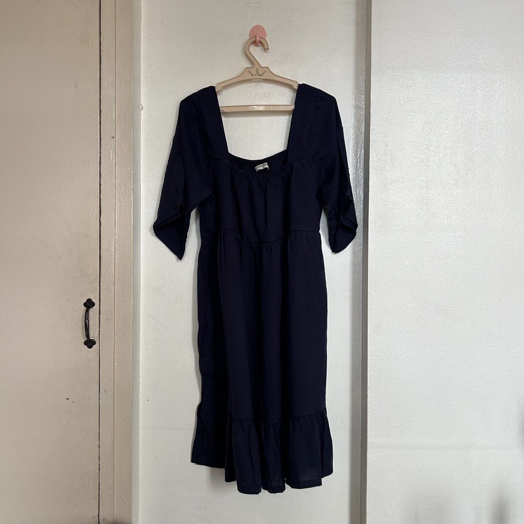 25THSHOP Navy Blue Square Neck Dress (Category: Dresses) located in Caloocan City. Submitted by mariasonya (Listing ID 1436102772, Image 2). Description: - Navy blue dress from 25THSHOP - Square neckline - Three-quarter sleeves - Tiered design - Ruffled hem - Lightweight fabric - Ideal for casual wear.
