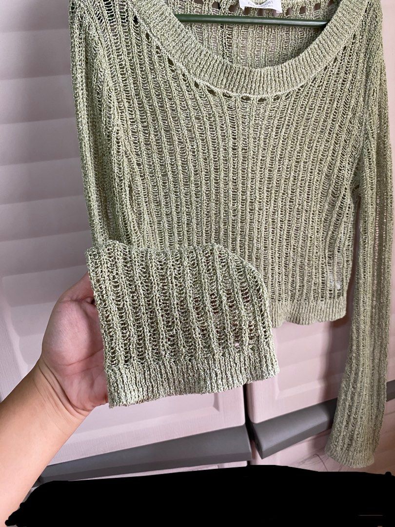 6IXTY8IGHT Cropped Knit Sweater (Category: Longsleeves) located in Makati City. Submitted by beaa24 (Listing ID 1435806814, Image 2). Description: - 6IXTY8IGHT cropped sweater - Color: Light green - Features: Round neckline, long flared sleeves - Design: Knit - Size: Small - Measurements: - Width: 37 cm - Length: 41 cm - Neckline: 2 cm.