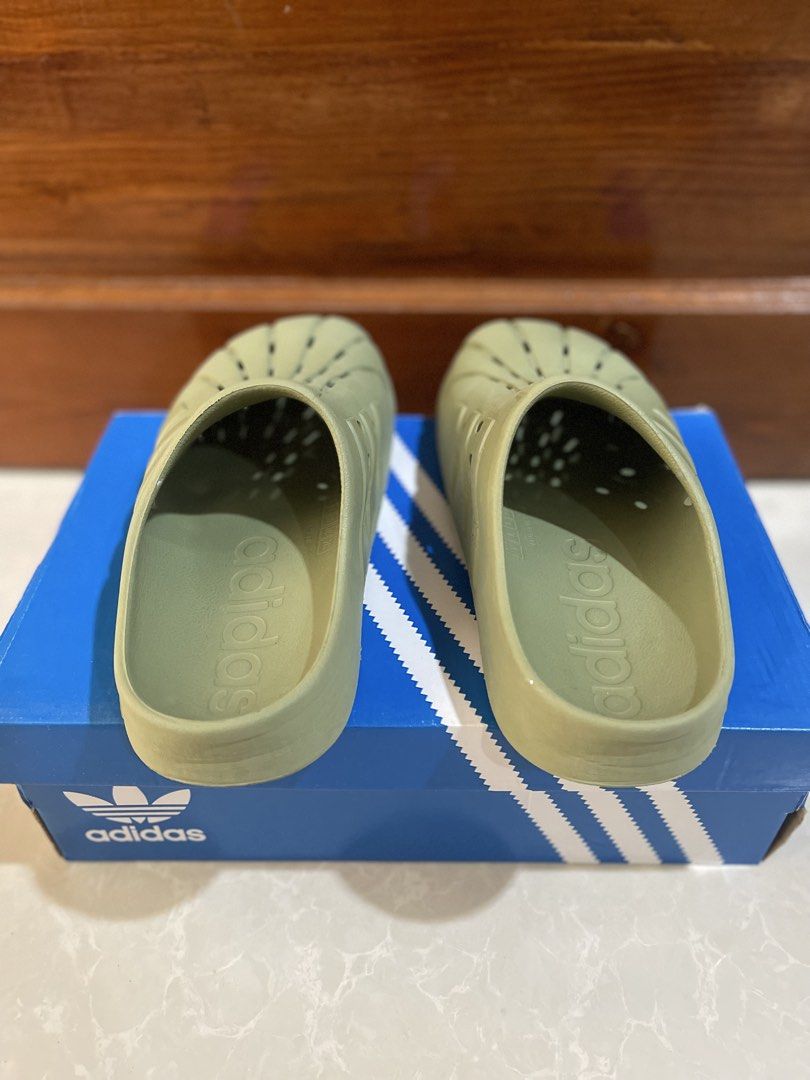 Adidas Adilette Clogs - Green (Category: Slippers & Slides) located in Minglanilla. Submitted by mi_jin (Listing ID 1436228591, Image 3). Description: ✨ PRELOVED Adidas Adilette Clogs (Green) — Unisex Condition: 9/10 (like new, no flaws) US: 6 (Men’s) / 7 (Women’s) UK: 6 EUR: 39 CM: 24 ❌ No box included — for photo purposes only ❌ 📍Cebu, City.