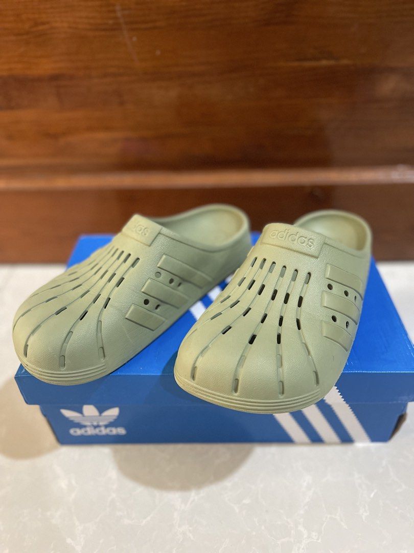 Adidas Adilette Clogs - Green (Category: Slippers & Slides) located in Minglanilla. Submitted by mi_jin (Listing ID 1436228591, Image 2). Description: ✨ PRELOVED Adidas Adilette Clogs (Green) — Unisex Condition: 9/10 (like new, no flaws) US: 6 (Men’s) / 7 (Women’s) UK: 6 EUR: 39 CM: 24 ❌ No box included — for photo purposes only ❌ 📍Cebu, City.