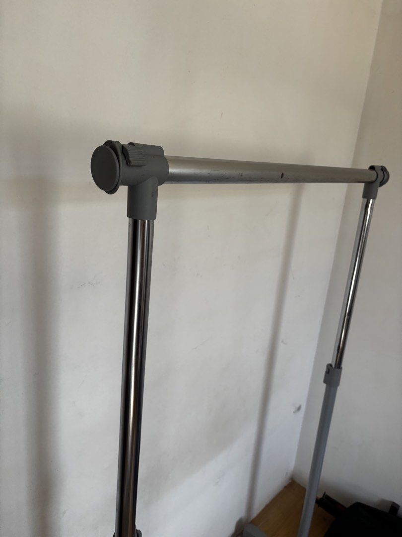 Adjustable Garment Rack w/ Wheels (Slightly used) (Category: Shelves, Cabinets & Racks) located in Angeles City. Submitted by lacnogabrielle8 (Listing ID 1436280106, Image 3). Description: FOR SALE: Adjustable Garment Rack w/ Wheels • Sturdy metal clothing rack • Adjustable height (can be extended) • With wheels – easy to move around • Minimalist gray + chrome design • Perfect for hanging clothes, OOTDs, laundry, or small spaces 💡 Easy to assemb