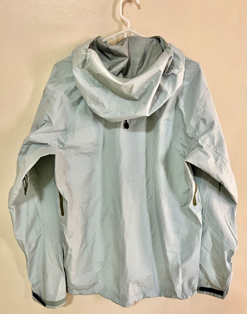 ARCTERYX Beta LT Shell Jacket - Ether Blue & Olive Green Zipper (Category: Coats, Jackets and Outerwear) located in Taguig. Submitted by LessThan (Listing ID 1436245678, Image 2). Description: ARCTERYX Softshell Hooded Lightweight Shell Jacket Light/Ether blue color & olive green zipper Size: Body (21" x 29" inches), Sleeves (27" x 6"-9" inches) 1.5 lbs(0.68 kg) - Features a hood for added protection - Constructed with Gore-Tex material - Lightwe