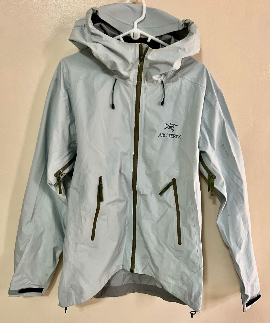 ARCTERYX Beta LT Shell Jacket - Ether Blue & Olive Green Zipper (Category: Coats, Jackets and Outerwear) located in Taguig. Submitted by LessThan (Listing ID 1436245678, Image 1). Description: ARCTERYX Softshell Hooded Lightweight Shell Jacket Light/Ether blue color & olive green zipper Size: Body (21" x 29" inches), Sleeves (27" x 6"-9" inches) 1.5 lbs(0.68 kg) - Features a hood for added protection - Constructed with Gore-Tex material - Lightwe