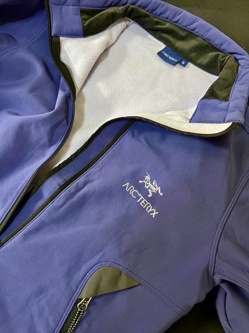 Arcteryx Softshell Jacket - BlueViolet (Category: Coats, Jackets and Outerwear) located in Taguig. Submitted by LessThan (Listing ID 1436240798, Image 3). Description: Arc'teryx softshell jacket Blue-violet color Size: Body (17" x 23" inches), Sleeves (22" x 5"-8" inches) - Full-zip closure - Two zippered hand pockets - Zippered chest pocket - Arc'teryx logo on chest - Fitted sleeves.