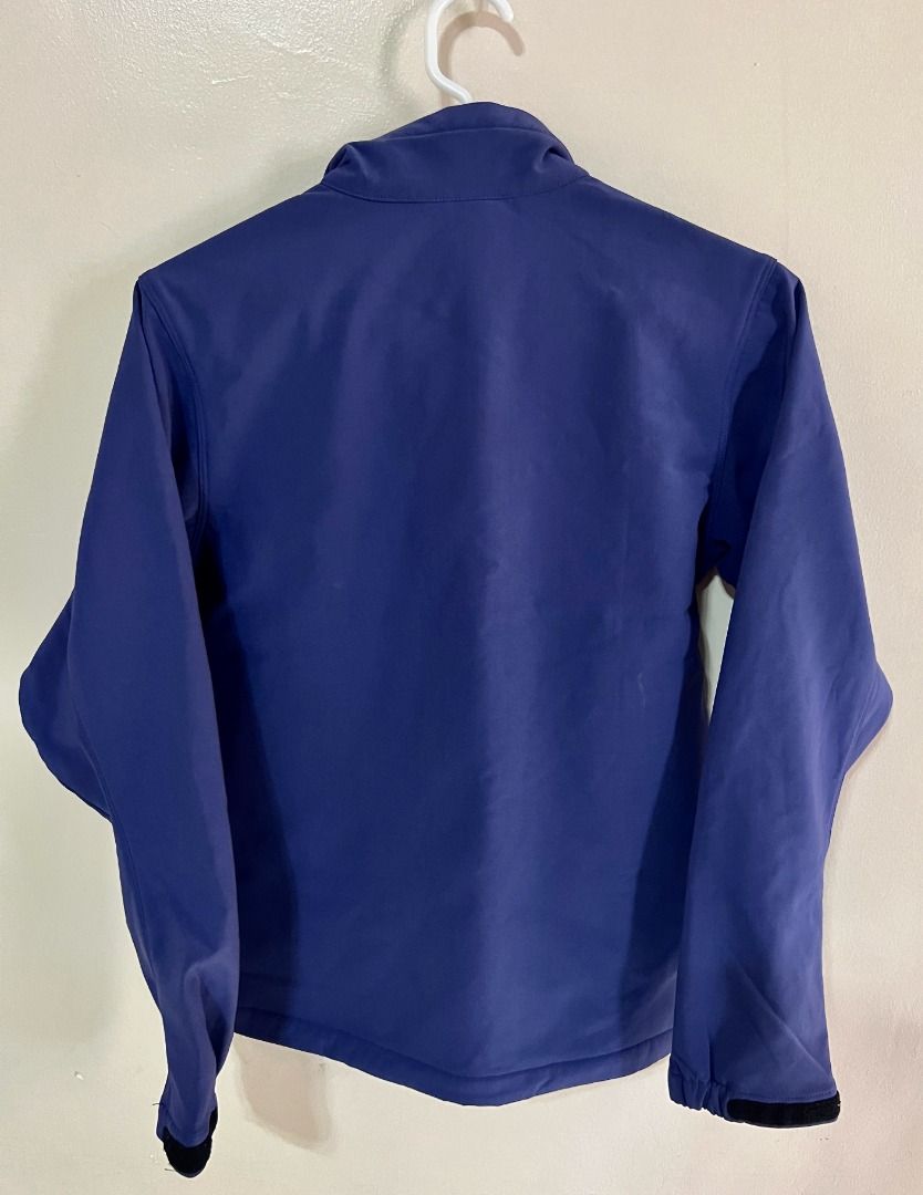 Arcteryx Softshell Jacket - BlueViolet (Category: Coats, Jackets and Outerwear) located in Taguig. Submitted by LessThan (Listing ID 1436240798, Image 2). Description: Arc'teryx softshell jacket Blue-violet color Size: Body (17" x 23" inches), Sleeves (22" x 5"-8" inches) - Full-zip closure - Two zippered hand pockets - Zippered chest pocket - Arc'teryx logo on chest - Fitted sleeves.