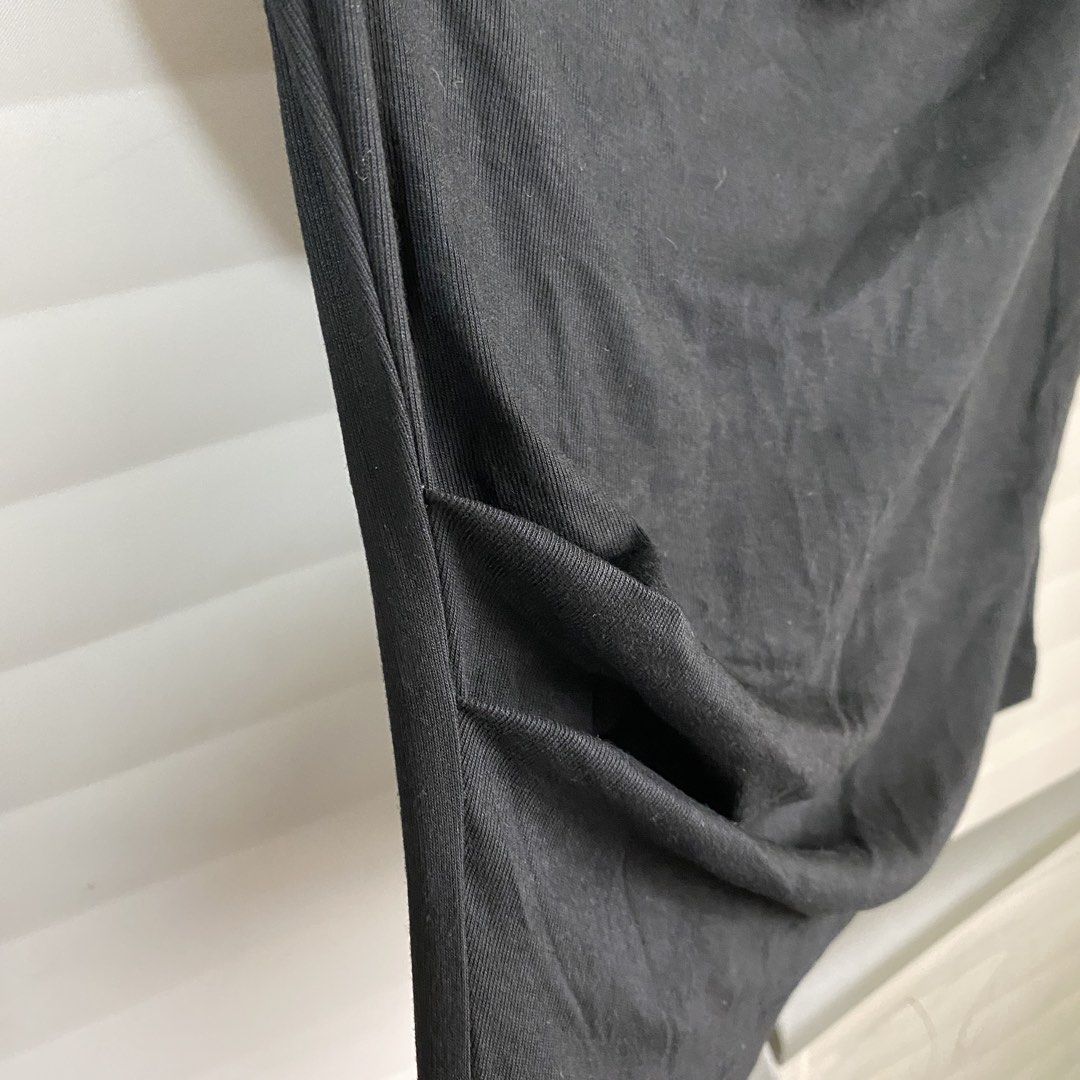 Asymmetrical top (Category: Blouses) located in Makati City. Submitted by beaa24 (Listing ID 1436124758, Image 2). Description: Never used fitted only and stored. With some lint that can be easily removed with a lint remover. Pwedeng one shoulder or off shoulder top. No when worn.