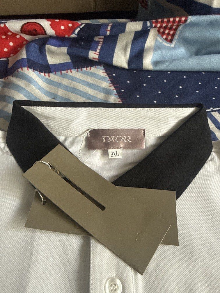 authentic CHRISTIAN DIOR white polo shirt (Category: Tshirts & Polo Shirts ) located in Angeles City. Submitted by cheska_0304 (Listing ID 1436105895, Image 3). Description: .