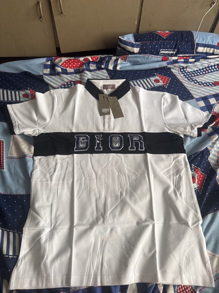 authentic CHRISTIAN DIOR white polo shirt (Category: Tshirts & Polo Shirts ) located in Angeles City. Submitted by cheska_0304 (Listing ID 1436105895, Image 1). Description: .