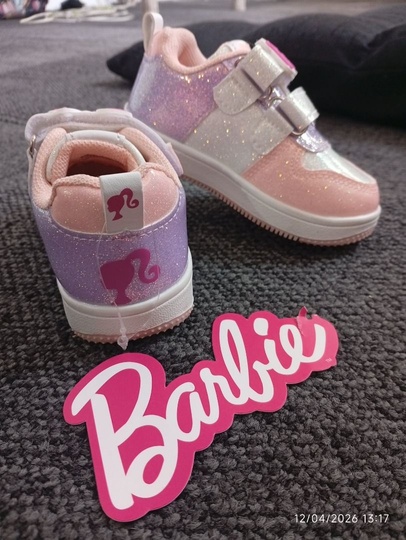 Barbie Sneakers for Toddlers (Category: Babies & Kids Fashion) located in Caloocan City. Submitted by averyielle05 (Listing ID 1436231019, Image 3). Description: Adorable Barbie sneakers in pink, white, and purple. Features a glittery design and Velcro straps for easy wear. The Barbie logo is visible on the tongue and heel. Perfect for little girls who love Barbie! Brand new | No box.