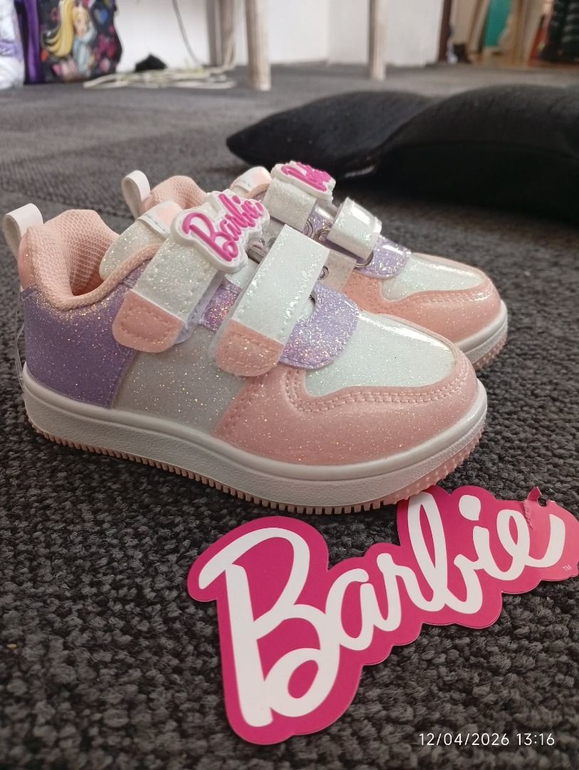 Barbie Sneakers for Toddlers (Category: Babies & Kids Fashion) located in Caloocan City. Submitted by averyielle05 (Listing ID 1436231019, Image 2). Description: Adorable Barbie sneakers in pink, white, and purple. Features a glittery design and Velcro straps for easy wear. The Barbie logo is visible on the tongue and heel. Perfect for little girls who love Barbie! Brand new | No box.