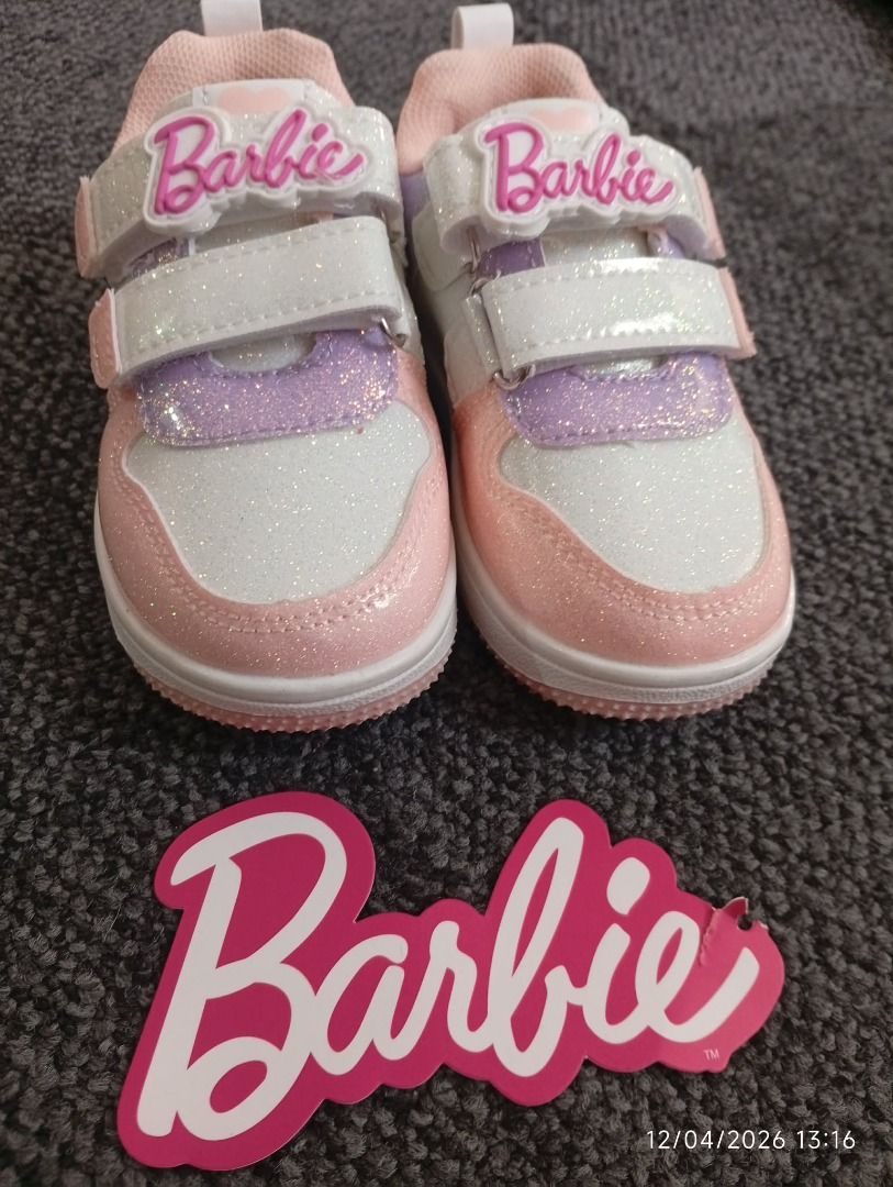 Barbie Sneakers for Toddlers (Category: Babies & Kids Fashion) located in Caloocan City. Submitted by averyielle05 (Listing ID 1436231019, Image 1). Description: Adorable Barbie sneakers in pink, white, and purple. Features a glittery design and Velcro straps for easy wear. The Barbie logo is visible on the tongue and heel. Perfect for little girls who love Barbie! Brand new | No box.
