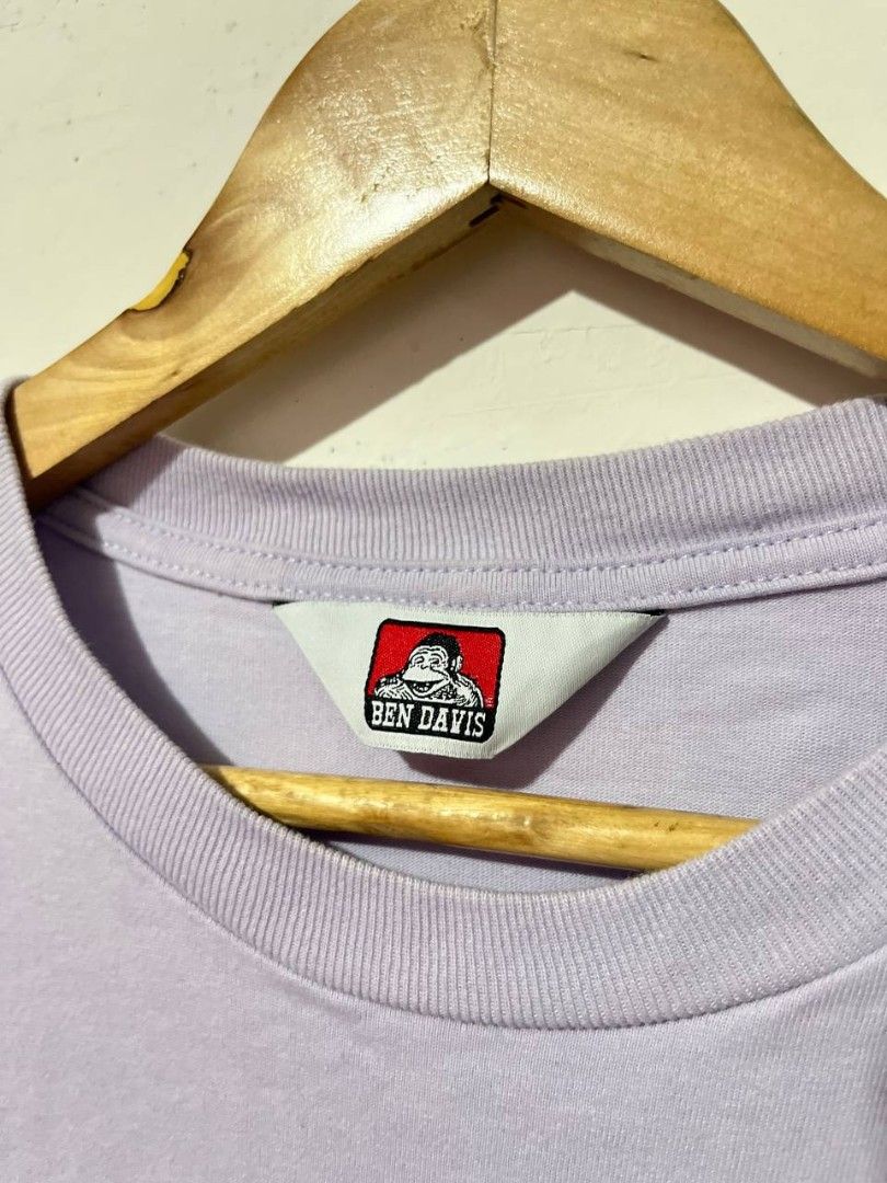 Ben Davis Graphic Tee (Category: Tshirts & Polo Shirts ) located in Quezon City. Submitted by 21st_thrifty (Listing ID 1436228416, Image 3). Description: - Ben Davis graphic tee - Light purple color - Size: XL - Front graphic: Worker and Ben Davis logo - Back graphic: Ben Davis logo and city names - Material: 100% cotton - Color rate 9/10 brand new condition .