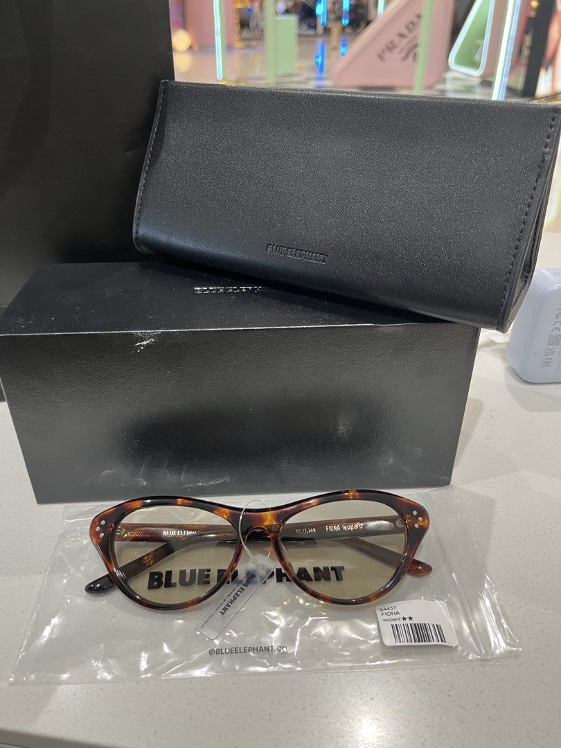 Blue Elephant Fiona Leopard Sunglasses (Category: Sunglasses & Eyewear) located in Manila. Submitted by rosemaryclothing (Listing ID 1436233217, Image 3). Description: Authentic Blue Elephant Fiona Leopard sunglasses. Comes with original box, case, and shopping bag. The sunglasses feature a tortoiseshell frame. The model name is Fiona Leopard. The glasses are still in their original packaging. Rfs: wrong model bought from pasabuy.