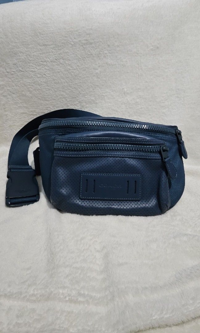 Coach belt bag blue green (Category: Belt bags, Clutches and Pouches) located in Marikina City. Submitted by joyfulfinds21 (Listing ID 1436167905, Image 1). Description: brand new but faded creed due to storage. genuine leather.