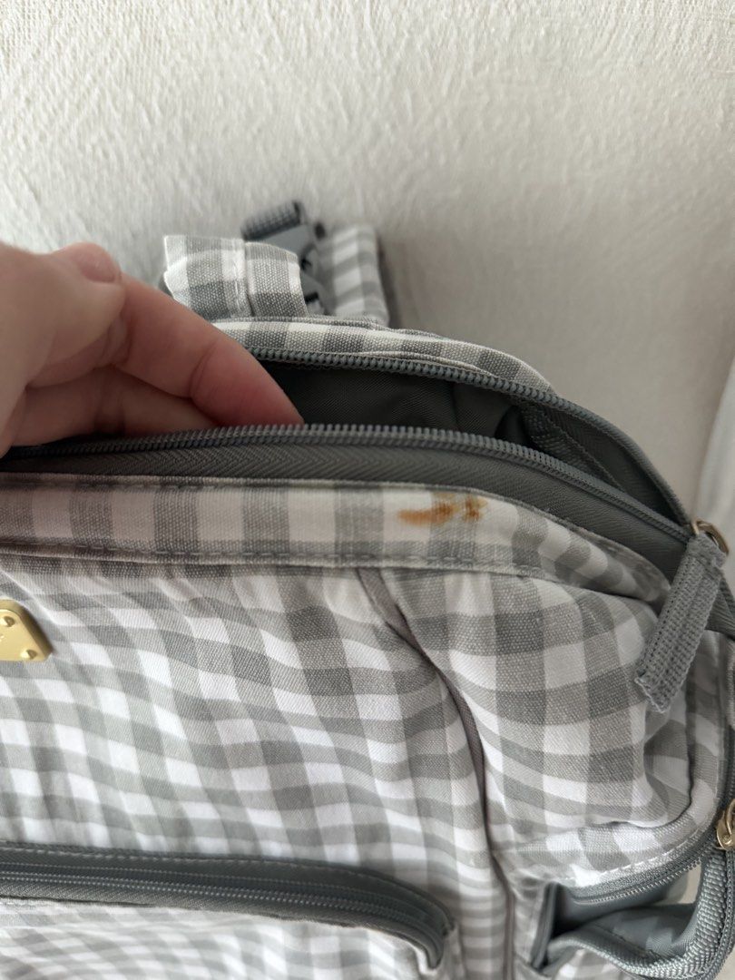 Carters Diaper Bag - Grey Gingham (Category: Diaper Bags & Wetbags) located in Makati City. Submitted by inezlebron (Listing ID 1436223276, Image 2). Description: - Classic grey gingham pattern - Multiple compartments for organization - Includes side pockets and a front zippered pocket - Can be worn as a backpack - Minor stains on the top of the bag.