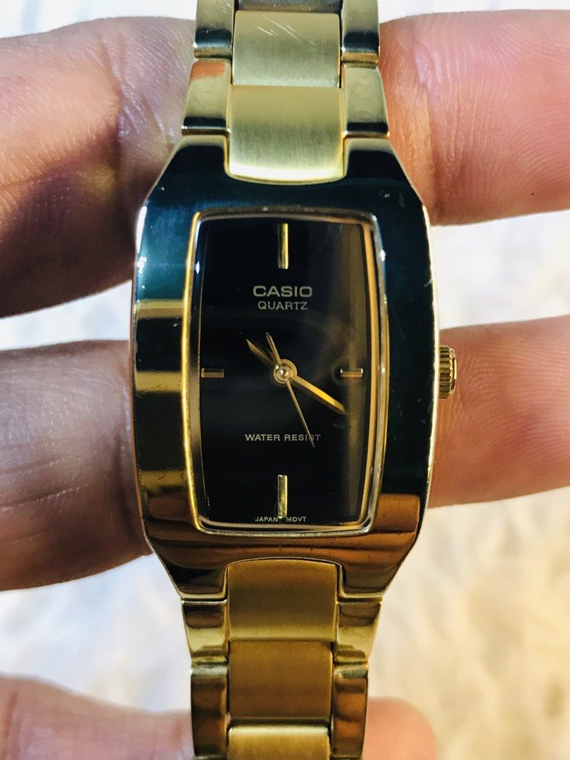 Casio Quartz Gold Watch LTP-1165 (Category: Women's Watches) located in Manila. Submitted by zerimar01 (Listing ID 1436232531, Image 2). Description: - Casio Quartz watch - Gold-toned finish - Black rectangular dial - Gold hands and markers - Stainless steel back - Water-resistant - Model: LTP-1165 - Made in China.