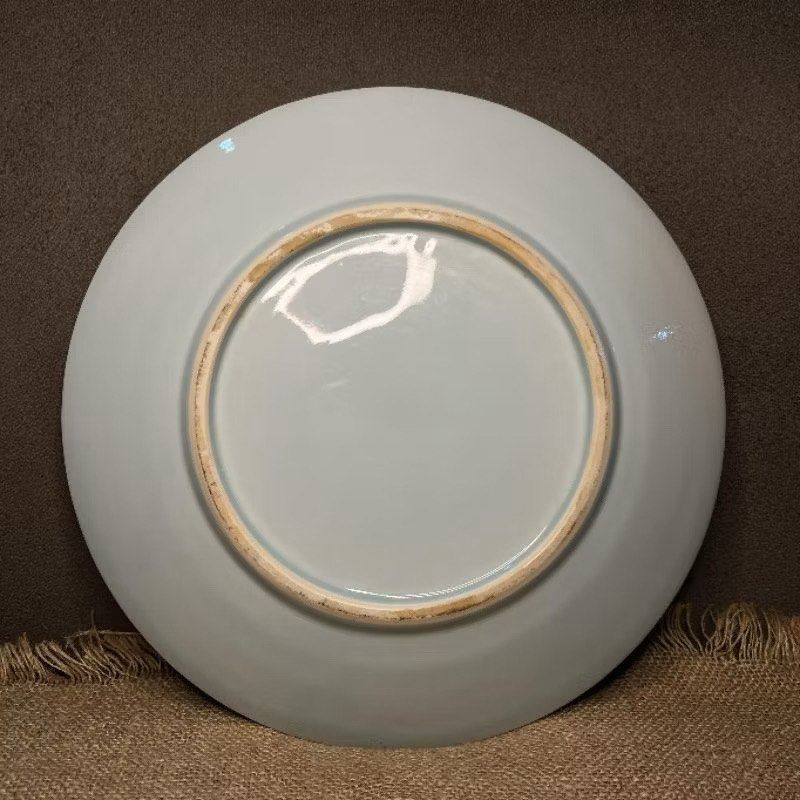 Celadon Platter with Radial Design (Category: Dinnerware & Cutlery) located in Bulacan. Submitted by ceramicscubby (Listing ID 1436224435, Image 3). Description: Size: 12.25 D x 1.3 H in. ❗️CLOSING DOWN SALE, ALL PRICES ARE MARKED DOWN. WE WILL NOT BE ACCEPTING OFFERS LOWER THAN OUR ASKING PRICE. ❗️ - Elegant celadon plate - Features a radial design - Beautiful light blue-green color - Circular foot on the underside - Adds a touch of elegance to 