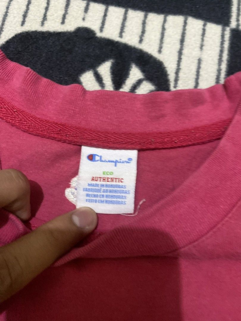 Champion Sleeveless Shirt (Category: Sleeveless) located in Taguig. Submitted by cabugchear34421 (Listing ID 1436274334, Image 3). Description: - Champion pink sleeveless shirt - Champion logo on chest and collar - Crew neck - Sleeveless design - Comfortable fabric - Perfect for warm weather.