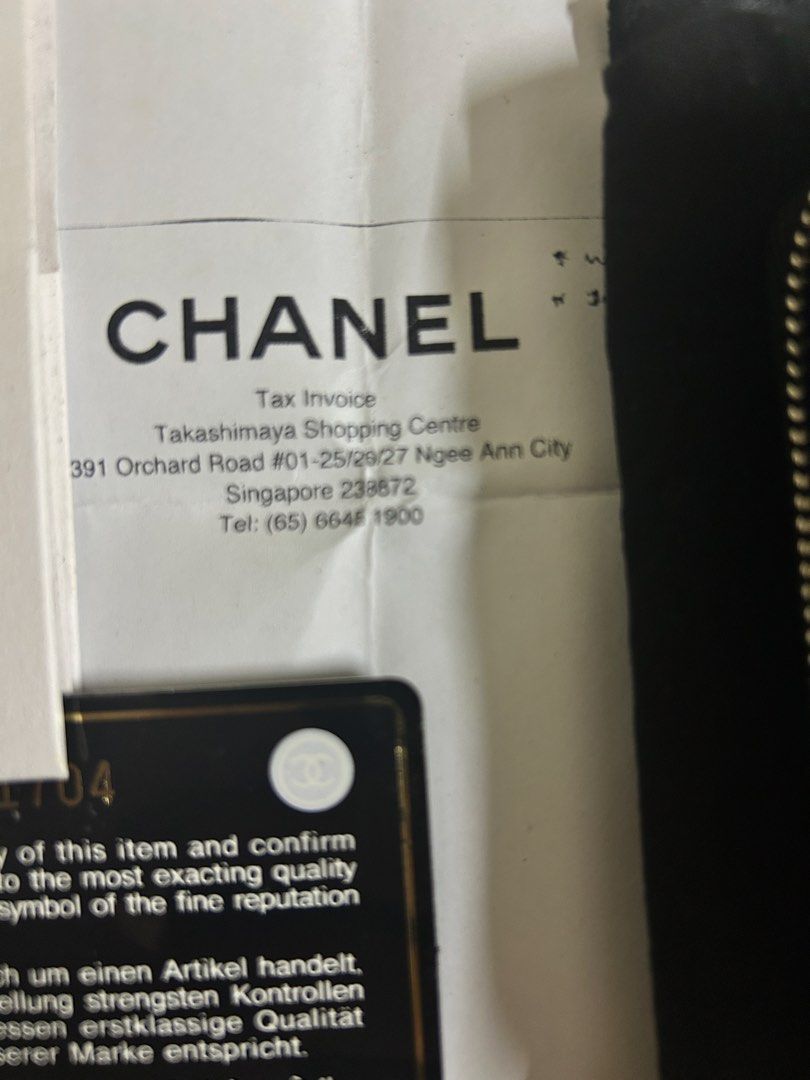 CHANEL authenticated zip-up card holder (Category: Bags & Wallets) located in Singapore. Submitted by zealturtle_372375 (Listing ID 1436248732, Image 3). Description: AUTHENTIC CHANEL ITEM flexible price brand new WITH RECIEPT. Perfect for a gift or self use leather texture immaculate with imprinted design in the wallet, amazing handcrafted luxury leather wallet. FAST DEAL-$480 original price $670(written in reciept) LOCATION to your convenience,