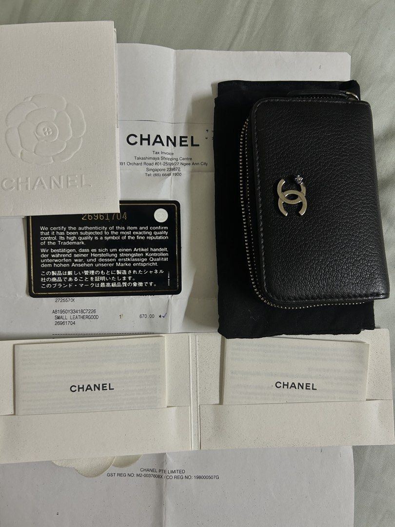 CHANEL authenticated zip-up card holder (Category: Bags & Wallets) located in Singapore. Submitted by zealturtle_372375 (Listing ID 1436248732, Image 1). Description: AUTHENTIC CHANEL ITEM flexible price brand new WITH RECIEPT. Perfect for a gift or self use leather texture immaculate with imprinted design in the wallet, amazing handcrafted luxury leather wallet. FAST DEAL-$480 original price $670(written in reciept) LOCATION to your convenience,