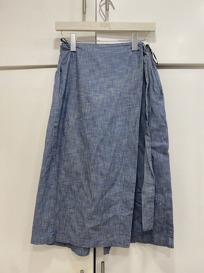 Chicify Wrap Skirt/Culottes XS (Category: Skirts) located in Mandaluyong City. Submitted by declutteringmodenow (Listing ID 1436177527, Image 1). Description: Chicify wrap skirt/culottes in a light blue color. Features a wrap design with a tie closure. The skirt is size XS. Made from cotton fabric, suitable for warm weather. .