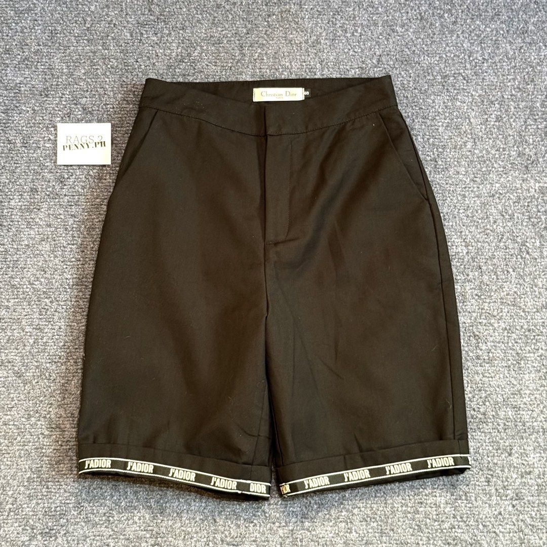 Christian Dior J'Adior Shorts (Category: Luxury Apparel) located in Kabacan. Submitted by rags2penny.phl (Listing ID 1436100754, Image 1). Description: - Christian Dior black shorts - Features the iconic J'Adior logo on the hem - Classic design with a tailored fit Waistline : 25-26 Length : 19.